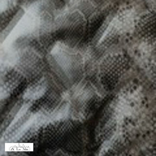 Gewatteerd - reptielenhuid - À La Ville