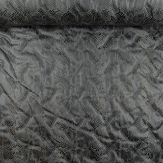 Gewatteerd - reptielenhuid - À La Ville